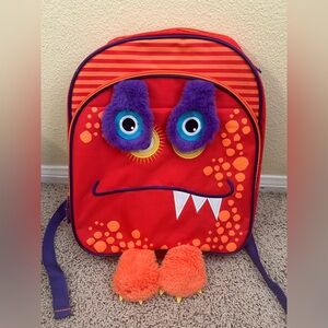 NWT New with tag Flipeez Orange monster squeeze pump kids toddler backpack